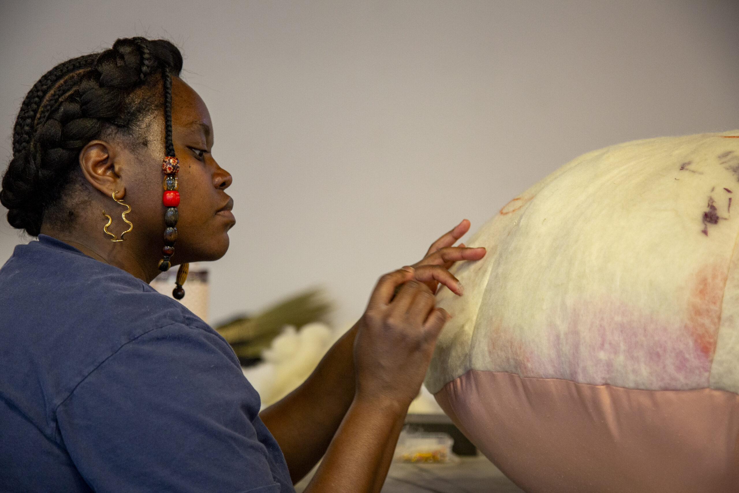 Nastassja Swift crafting "lion spine relaxed" furniture sculpture. Photo by Billy Chen at Arts Letters & Numbers.