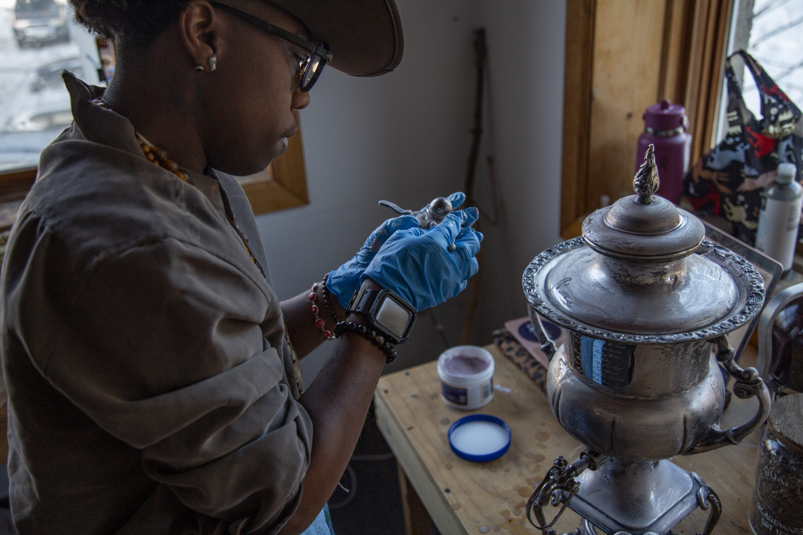 Spirit Adams preparing an inscribed vessel for the libations. Photo by Billy Chen at Arts Letters & Numbers.