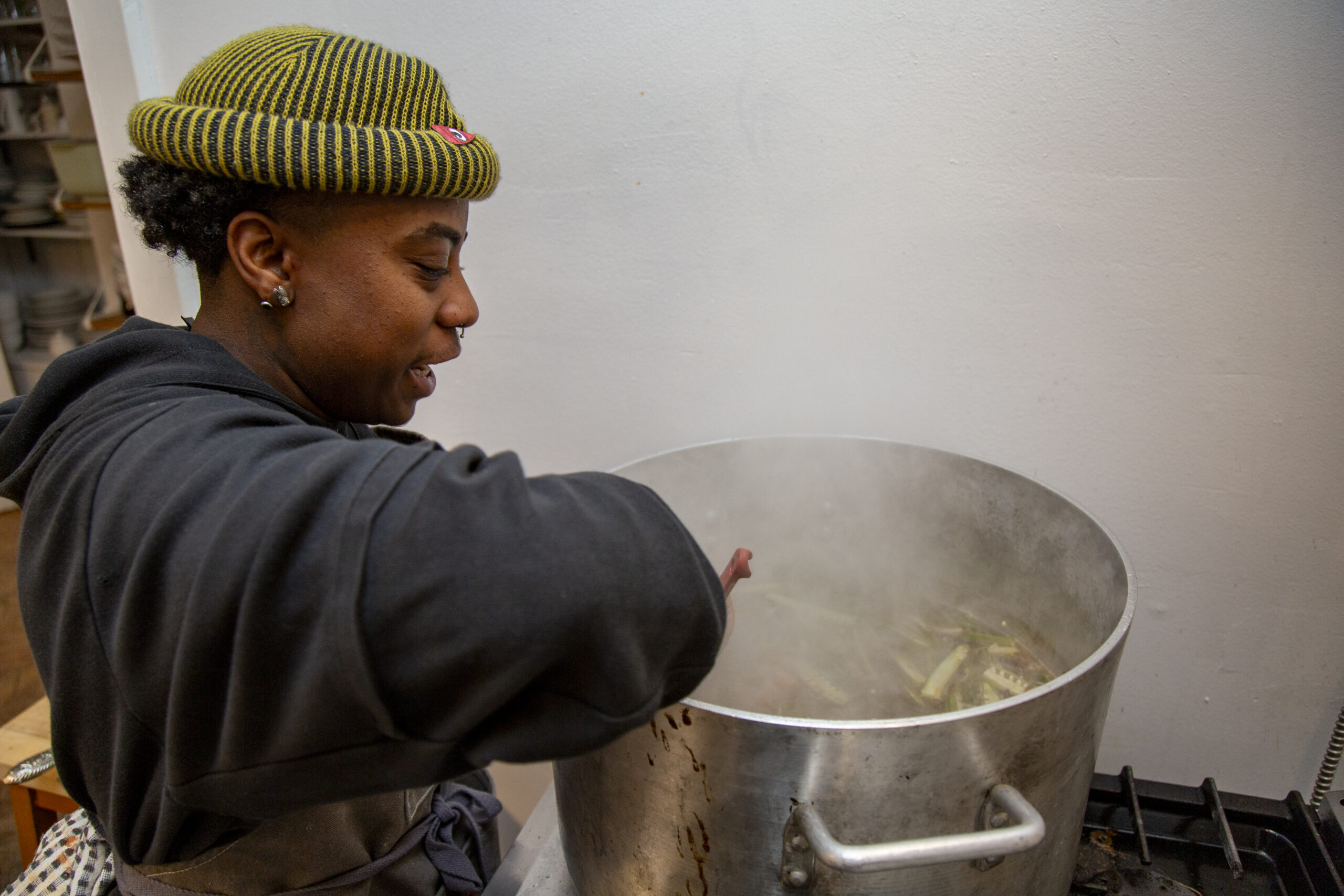 Artist Spirit Adams crafts a dinner inspired by the turnip and okra stew that June Jordan made for Mrs. Fannie Lou Hamer. Image courtesy of Arts Letters & Numbers, Averill Park, NY., taken by Billy Chen.